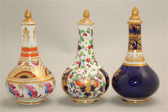 Three Derby porcelain scent bottles and stoppers, early 19th century, 10.5 - 11cm